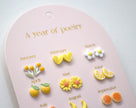 Yuko-B Kids Ceramic Stud Earrings Set – Yellow Motifs (12 Pairs)
