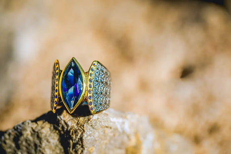 Sterling Silver Sculptural Ring with Swiss Blue Topaz and White Zircon