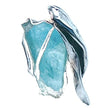 Blue stone in a silver setting on a white background