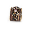 Dark brown leather statement cuff with black, gold and burgundy crystals by The Dark Atelier