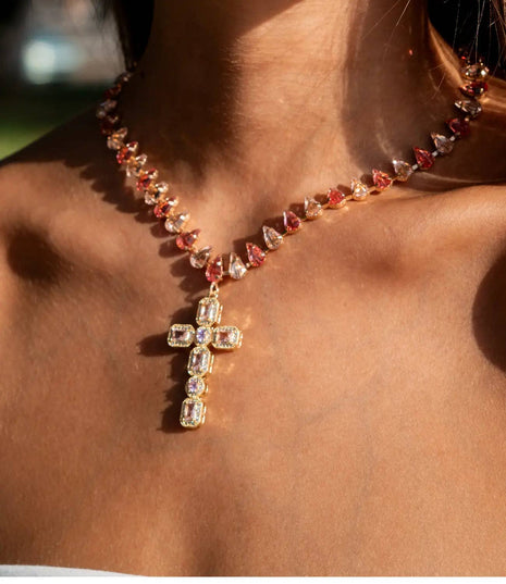 Necklace with a cross pendant on a person's neck
