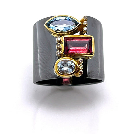 “Wide black rhodium silver ring with 14K gold settings, tourmaline, aquamarine and brown diamond – ENOTIA”
